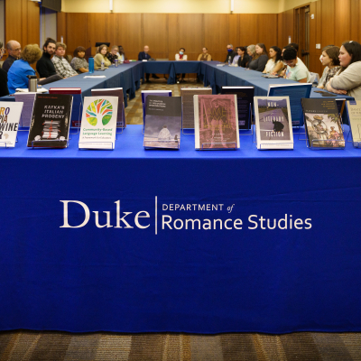 table with several Romance Studies books displayed